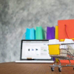 laptop and shopping bags, online shopping concept